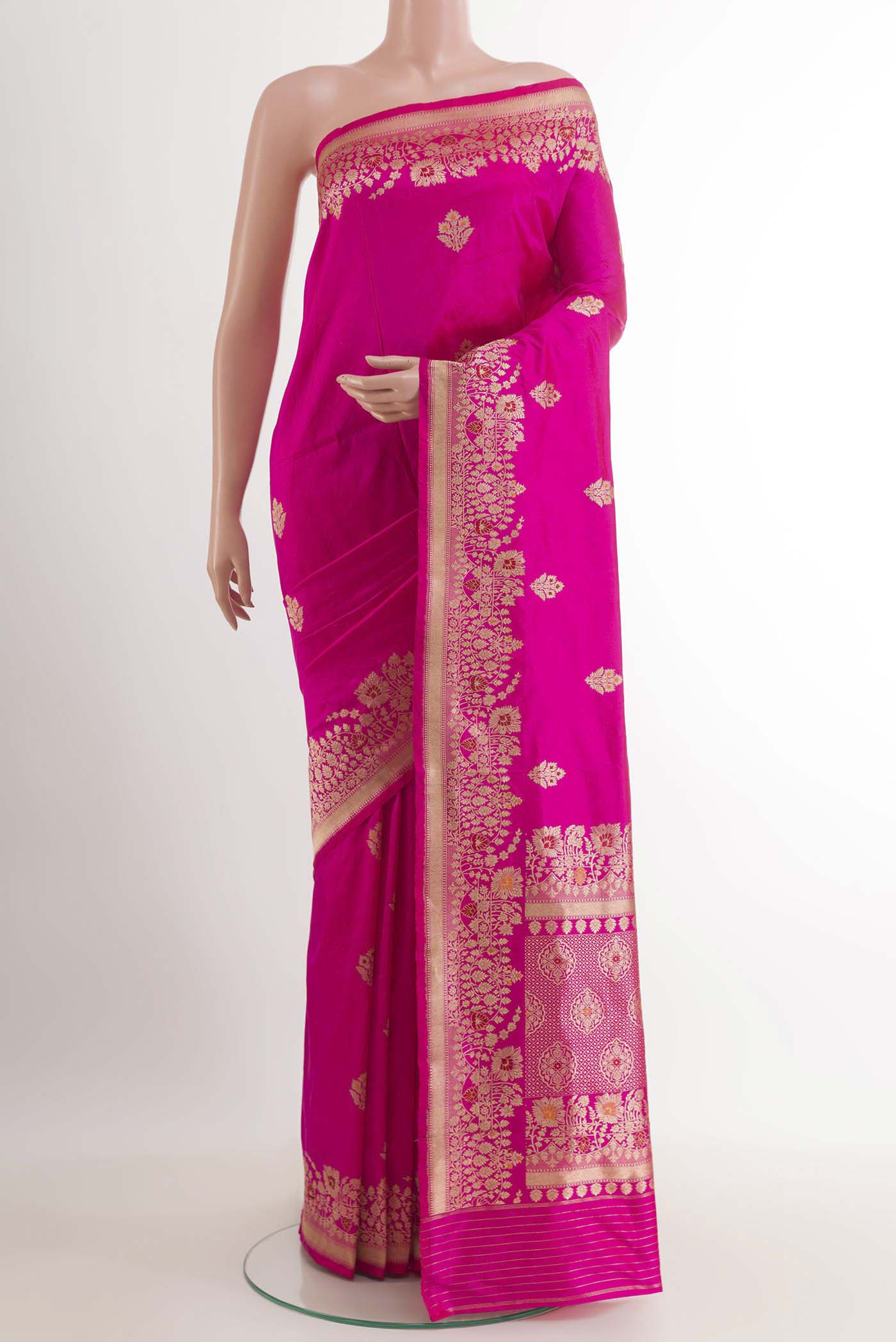 Pink Banarasi Katan Silk Saree with Zari Butta on the body and Zari Border.  displayed on a mannequin