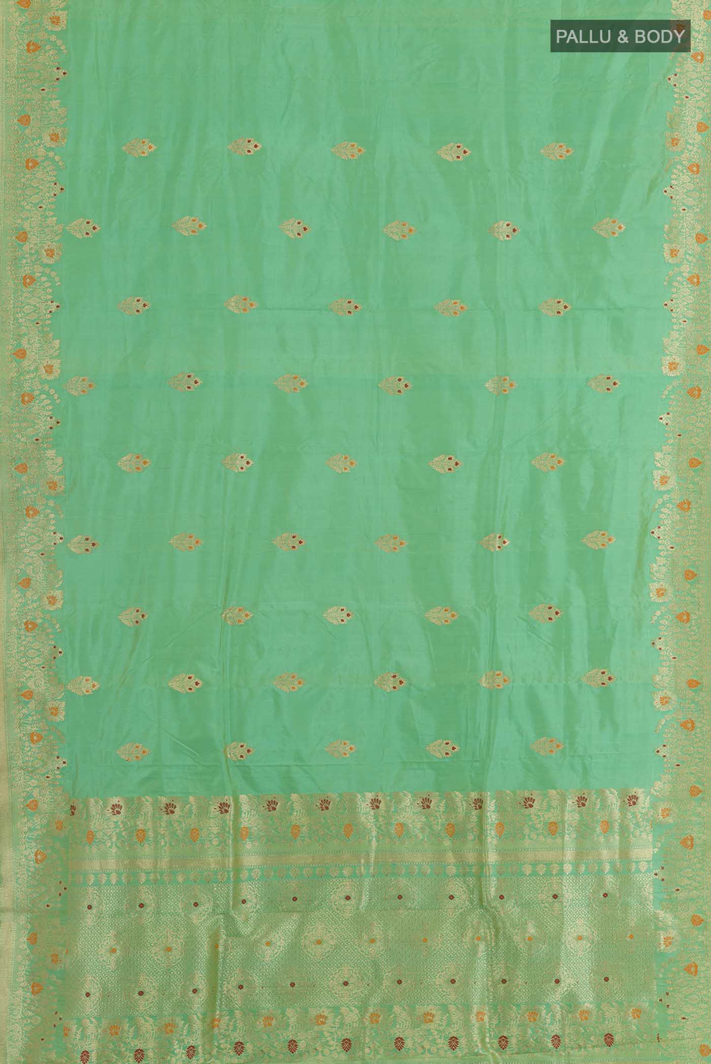 Flat view of Green Banarasi Katan Silk Saree with Zari Butta on the body and Zari Border. 