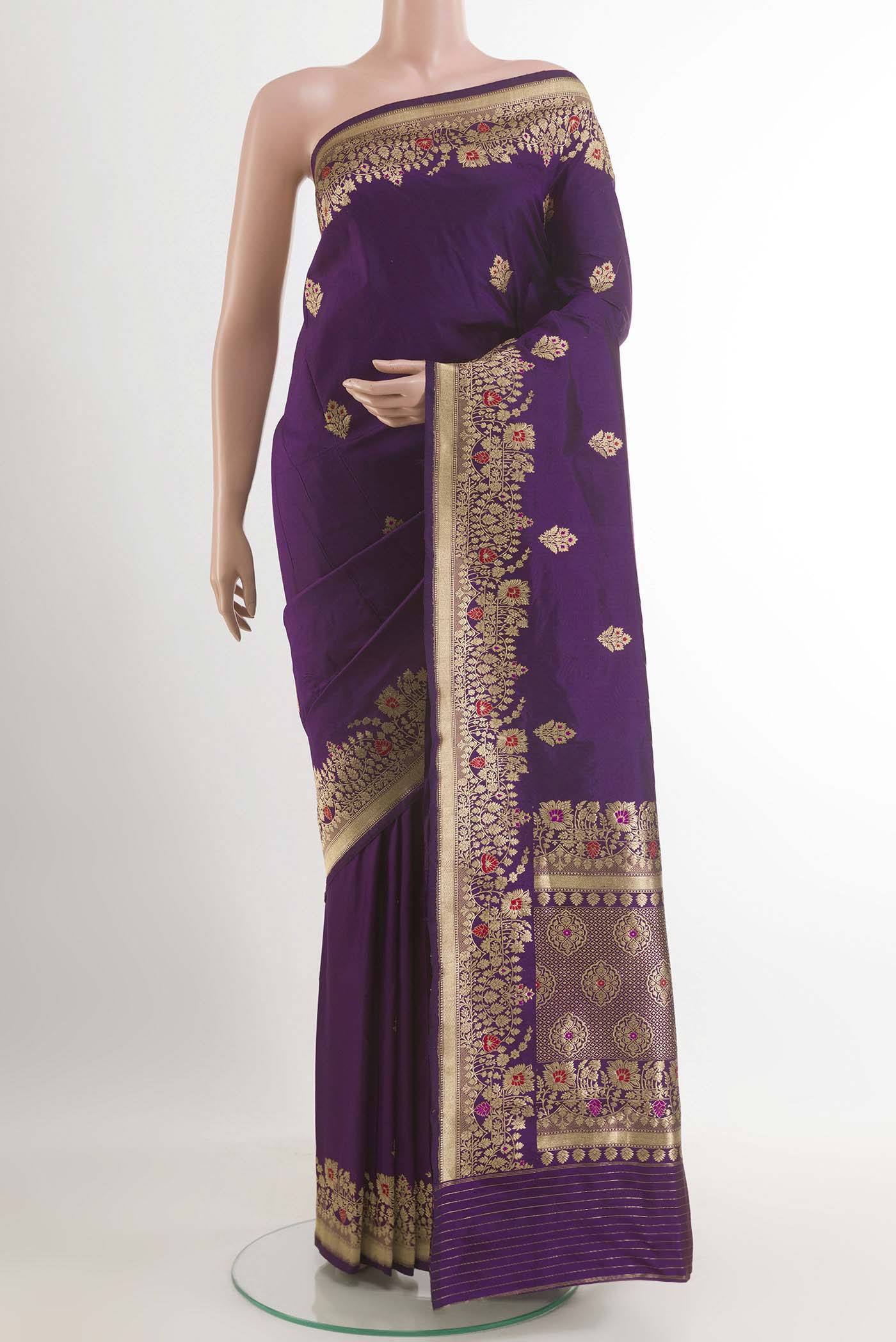 Purple Banarasi Katan Silk Saree with Zari Butta on the body and Zari Border.  displayed on a mannequin