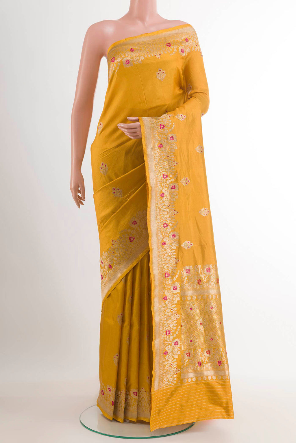 Yellow Banarasi Katan Silk Saree with Zari Butta on the body and Zari Border.  displayed on a mannequin