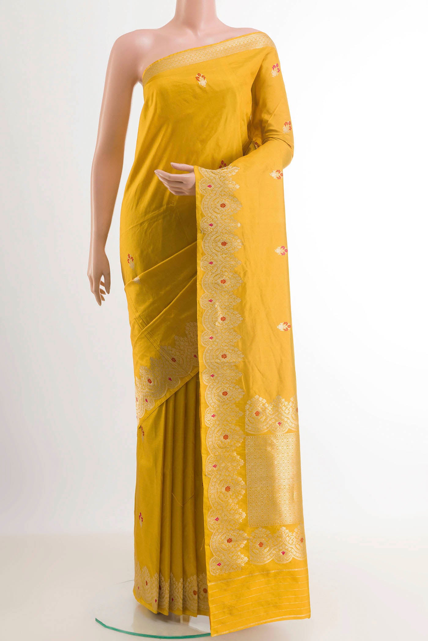 Yellow Banarasi Katan Silk Saree with Zari Butta on the body and Zari Border.  displayed on a mannequin