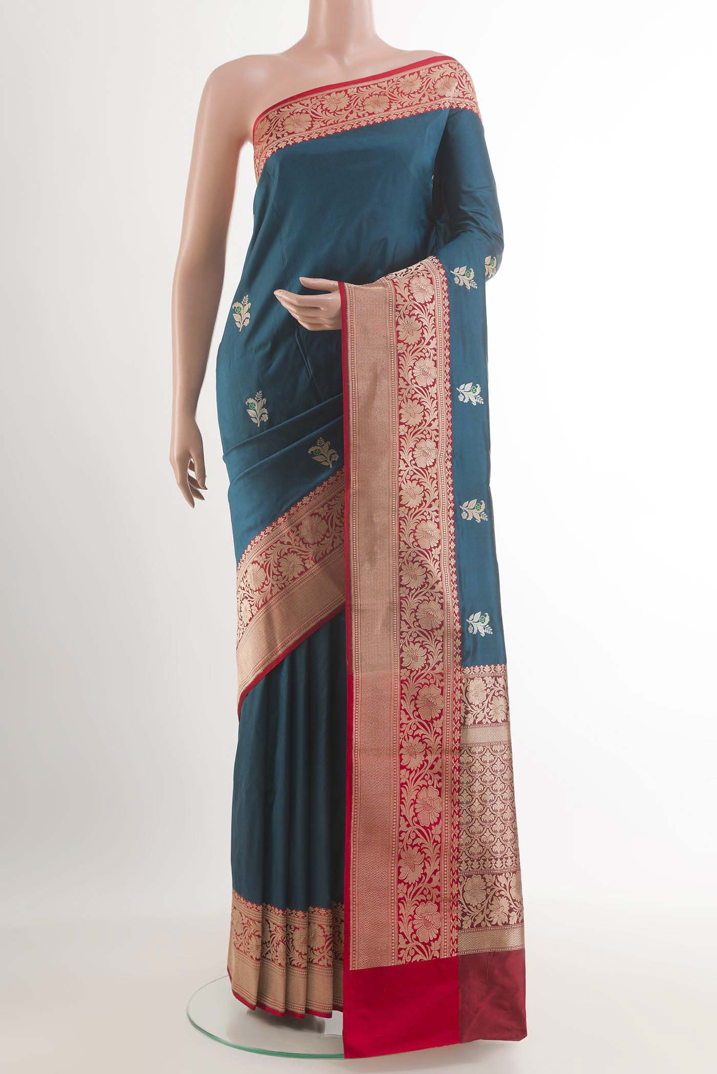 Royal Blue Banarasi Katan Silk Saree with Zari Butta on the body and Zari Border.  displayed on a mannequin