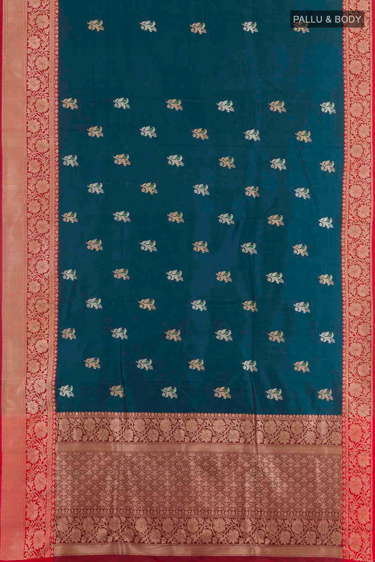 Flat view of Royal Blue Banarasi Katan Silk Saree with Zari Butta on the body and Zari Border. 