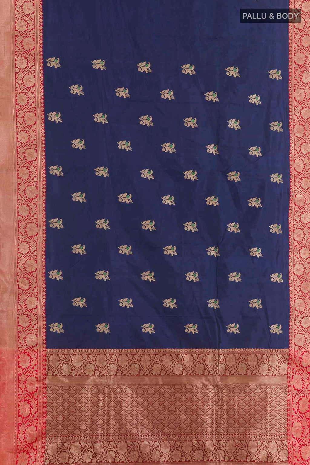 Flat view of Royal Blue Banarasi Katan Silk Saree with Zari Butta on the body and Zari Border. 