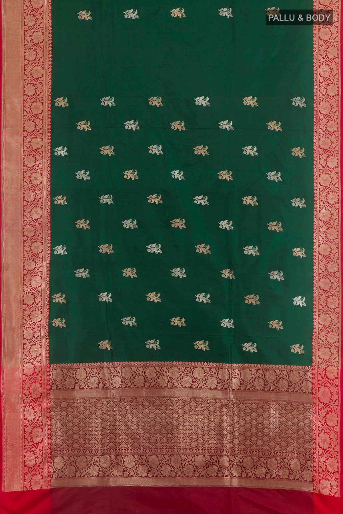 Flat view of Bottle Green Banarasi Katan Silk Saree with Zari Butta on the body and Zari Border. 
