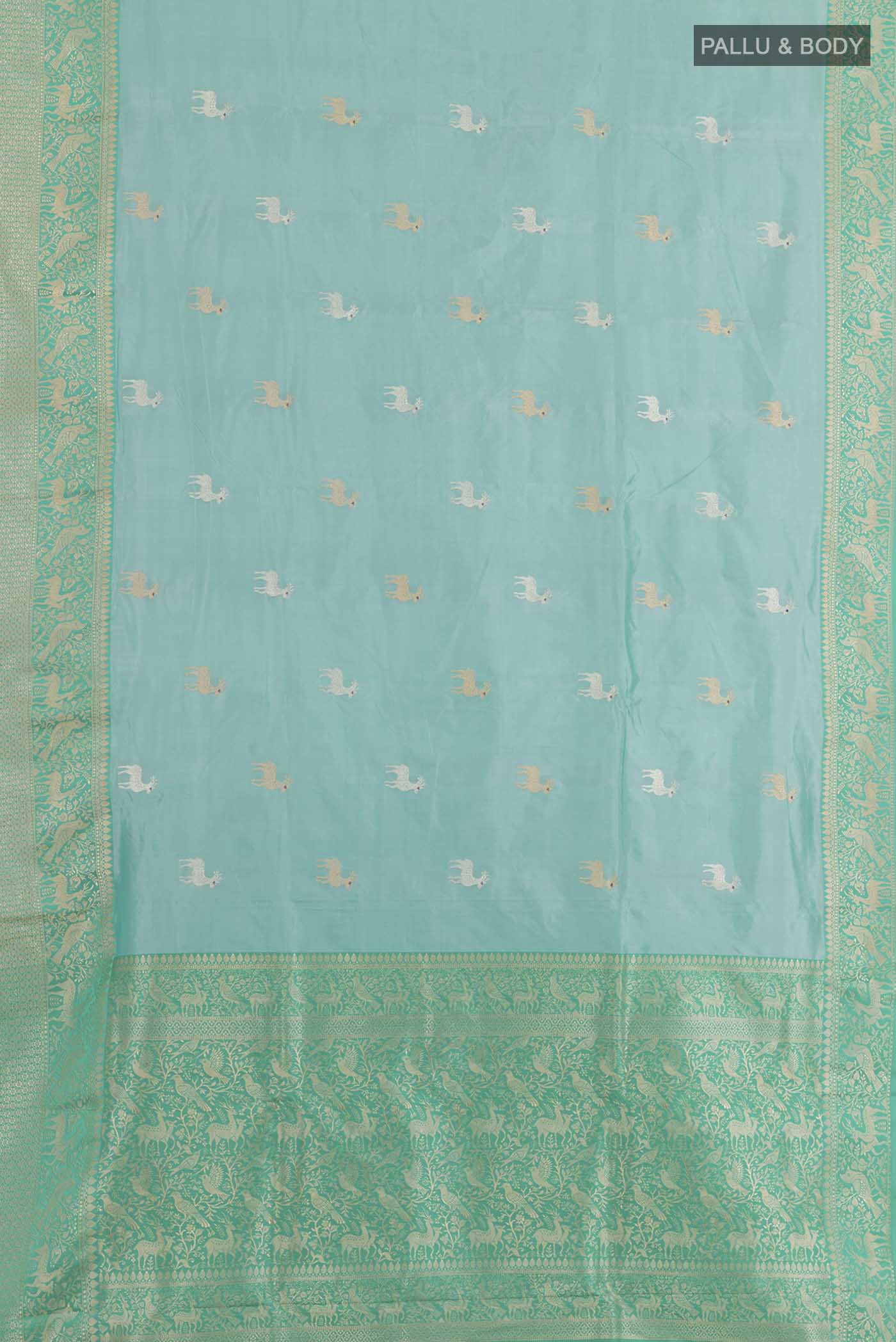 Flat view of Blue Banarasi Katan Silk Saree with Zari Butta on the body and Zari Border. 