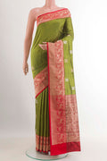 Green Banarasi Katan Silk Saree with Zari Butta on the body and Zari Border.  displayed on a mannequin