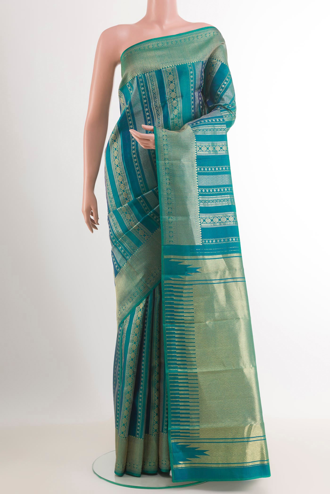Green Dual Tone Kanchipuram Silk Saree with Zari Brocade on the body and Zari Border.  displayed on a mannequin