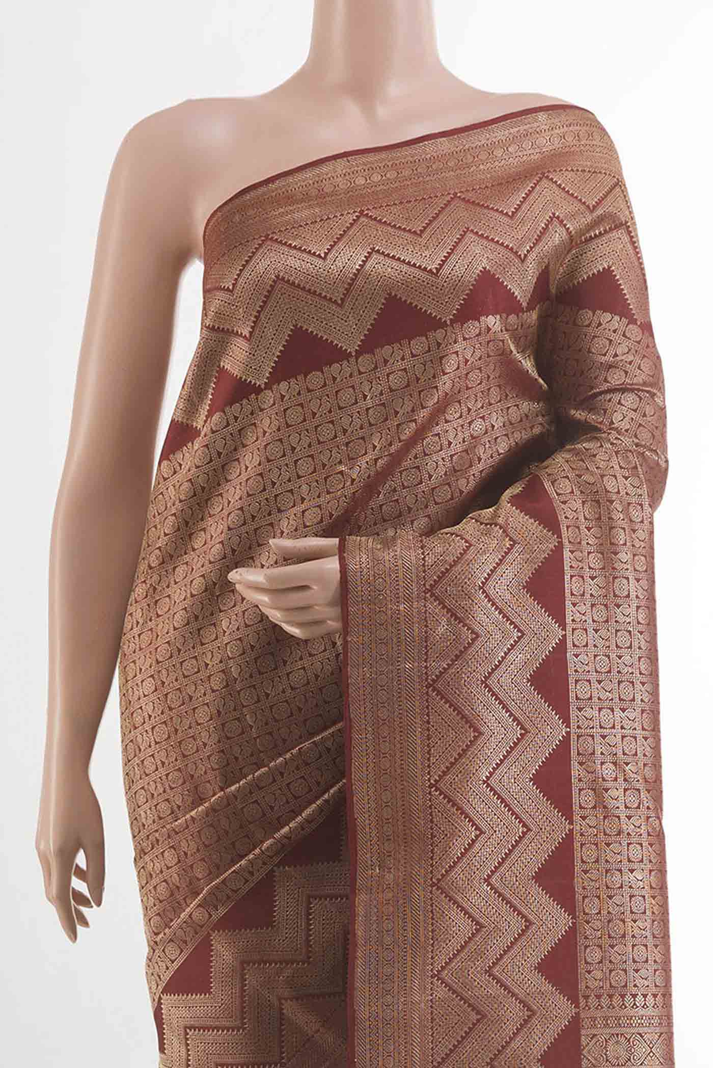 Border image of Maroon Kanchipuram Silk Saree with Zari Brocade on the body and Zari Border. 