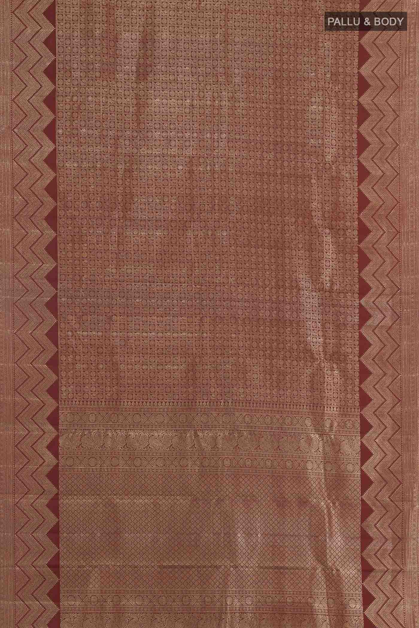 Flat view of Maroon Kanchipuram Silk Saree with Zari Brocade on the body and Zari Border. 