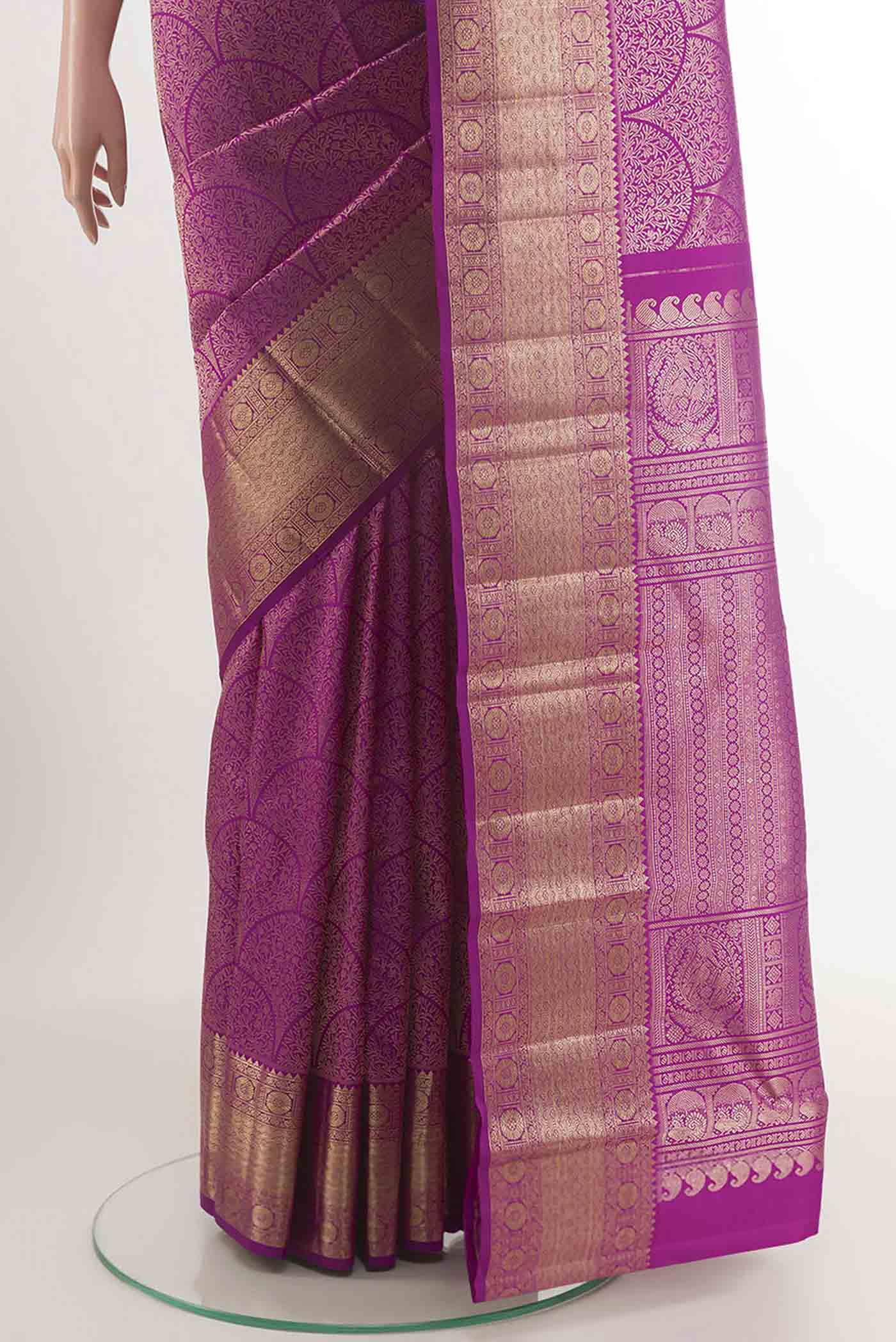 Pleats and pallu of Purple Kanchipuram Silk Saree with Zari Brocade on the body and Zari Border. 