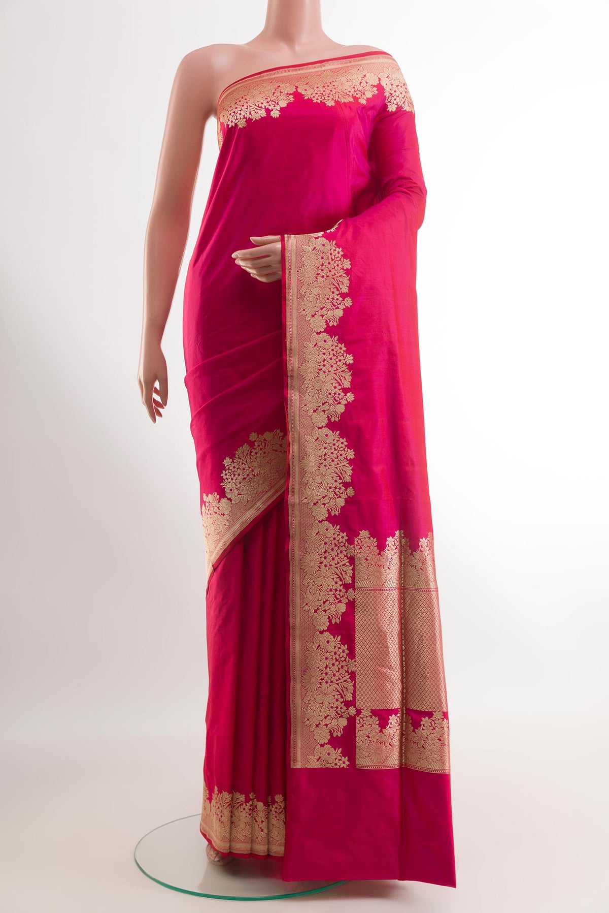 Pink Banarasi Silk Saree with Plain Body and Zari Border.  displayed on a mannequin