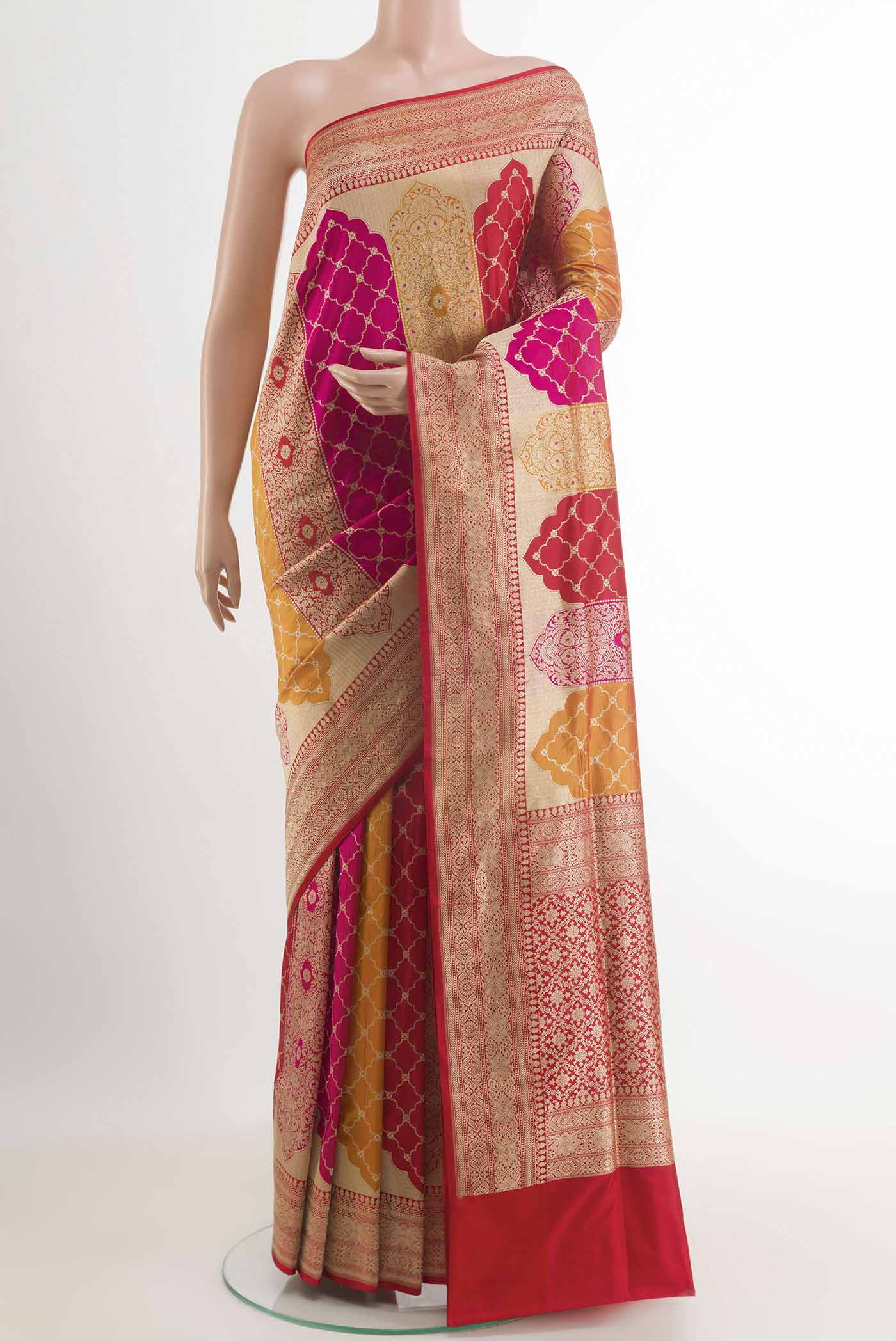 Multi Color Banarasi Silk Saree with Zari Brocade on the body and Zari Border.  displayed on a mannequin