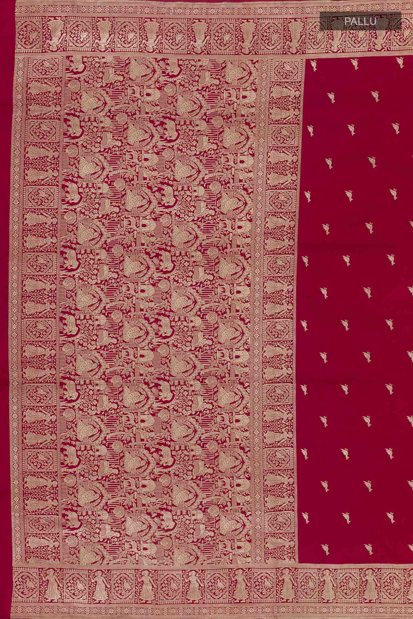 Close up image of the pallu of Red Banarasi Silk Saree with Zari Butta on the body and Zari Border. 