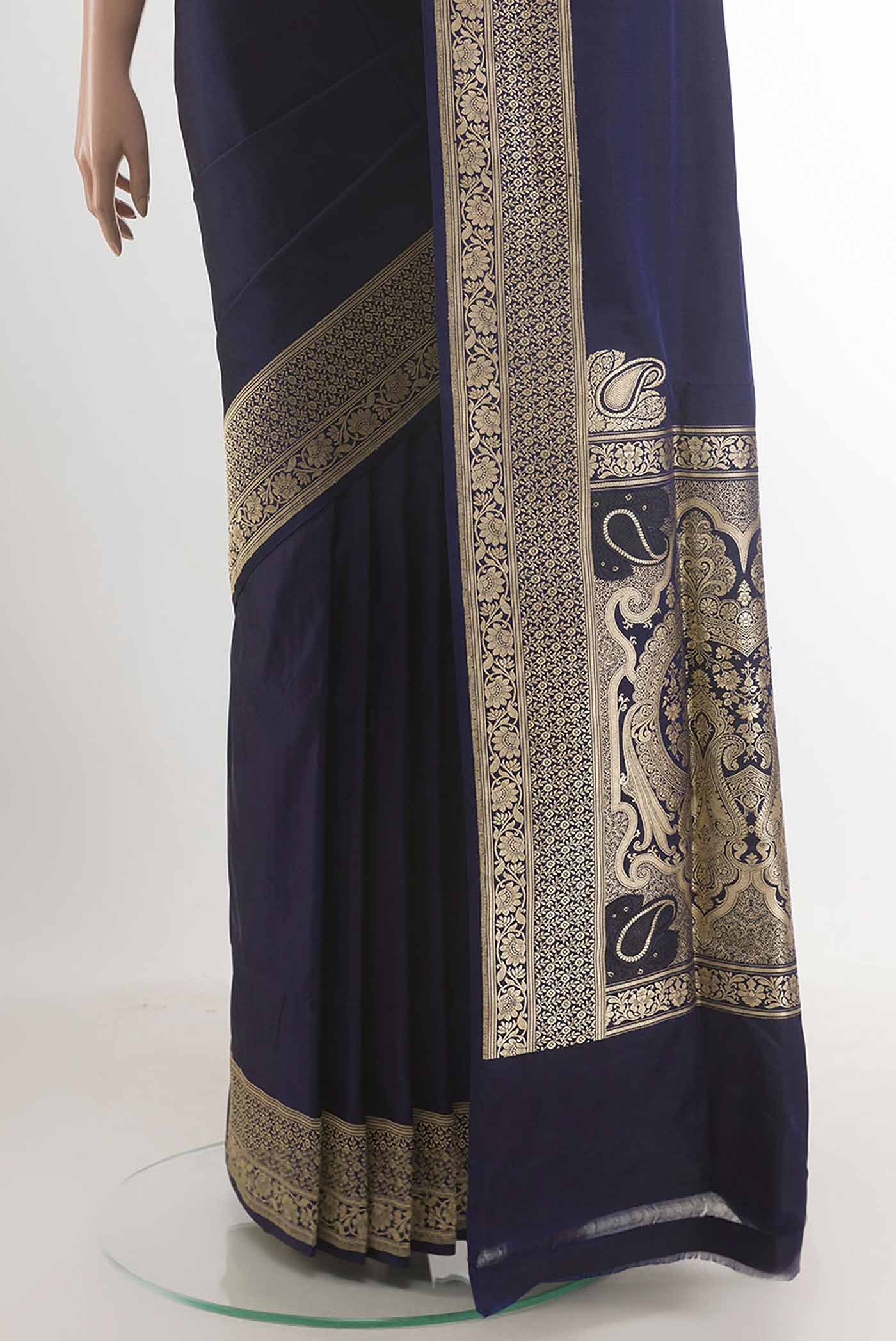 Pleats and pallu of Dark Blue Banarasi Silk Saree with Plain Body and Zari Border. 