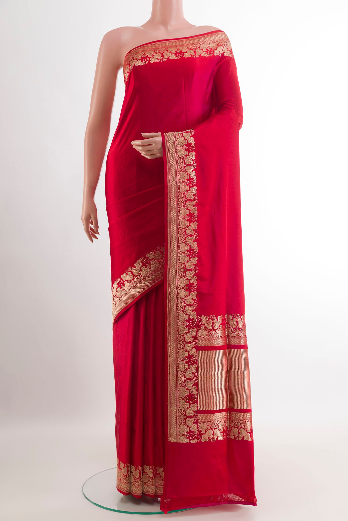 Red Banarasi Silk Saree with Plain Body and Zari Border.  displayed on a mannequin
