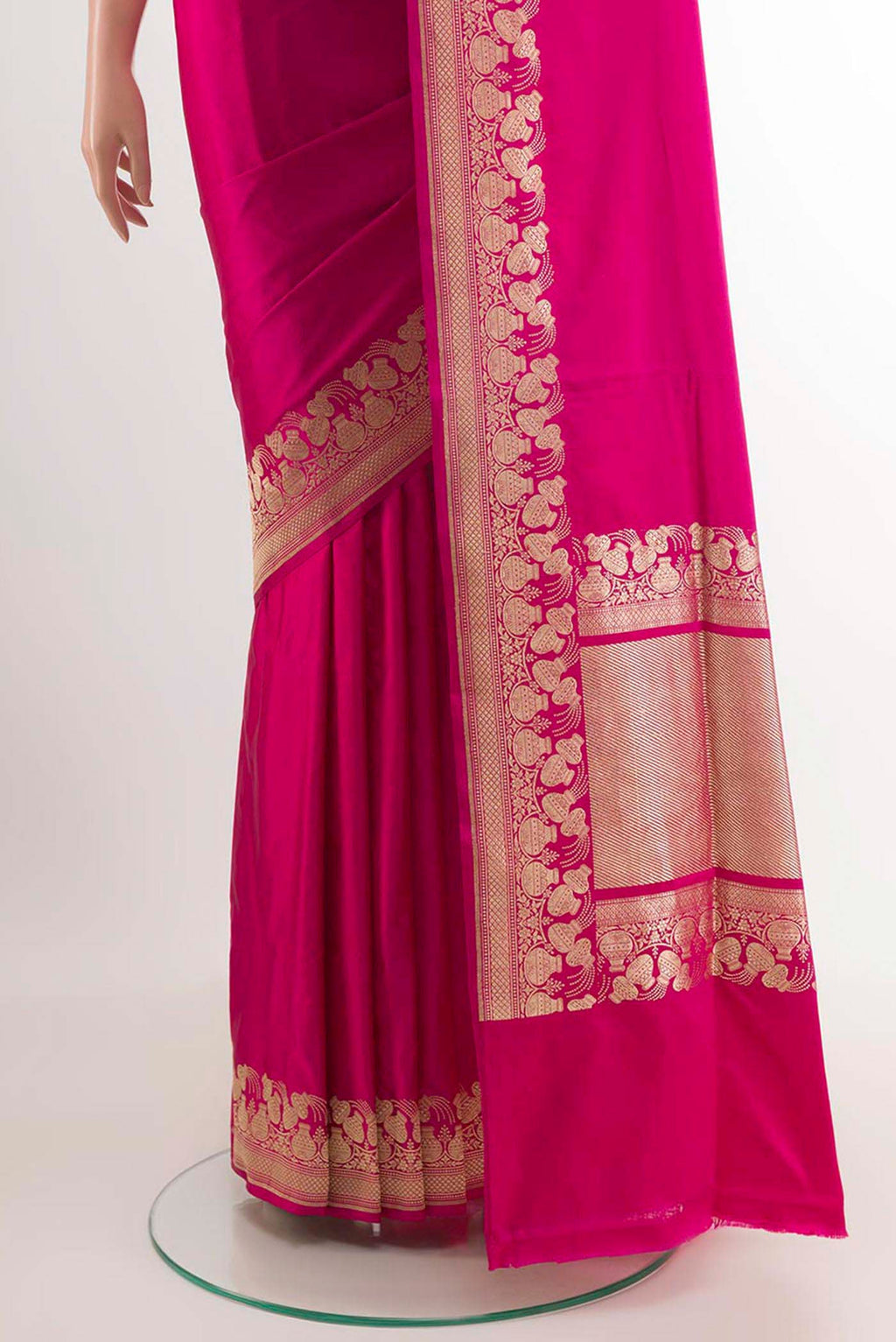 Pleats and pallu of Pink Banarasi Saree with Plain Body and Zari Border. 