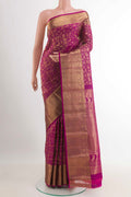 Rani Pink Kanchipuram Silk Saree with Zari Brocade on the body and Zari Border.  displayed on a mannequin