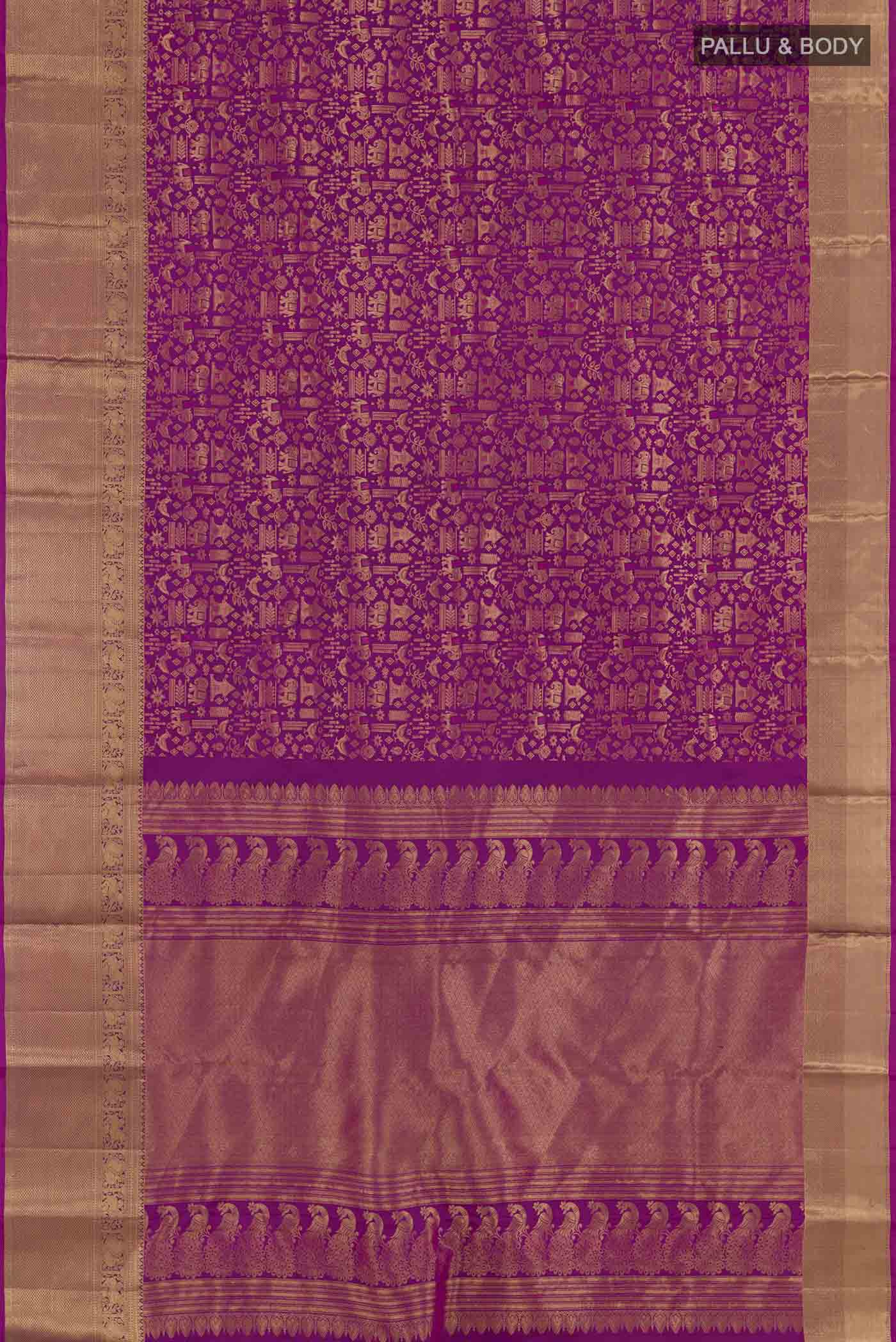 Flat view of Rani Pink Kanchipuram Silk Saree with Zari Brocade on the body and Zari Border. 