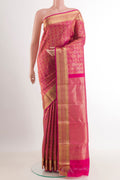 Rani Pink Kanchipuram Silk Saree with Zari Brocade on the body and Zari Border.  displayed on a mannequin