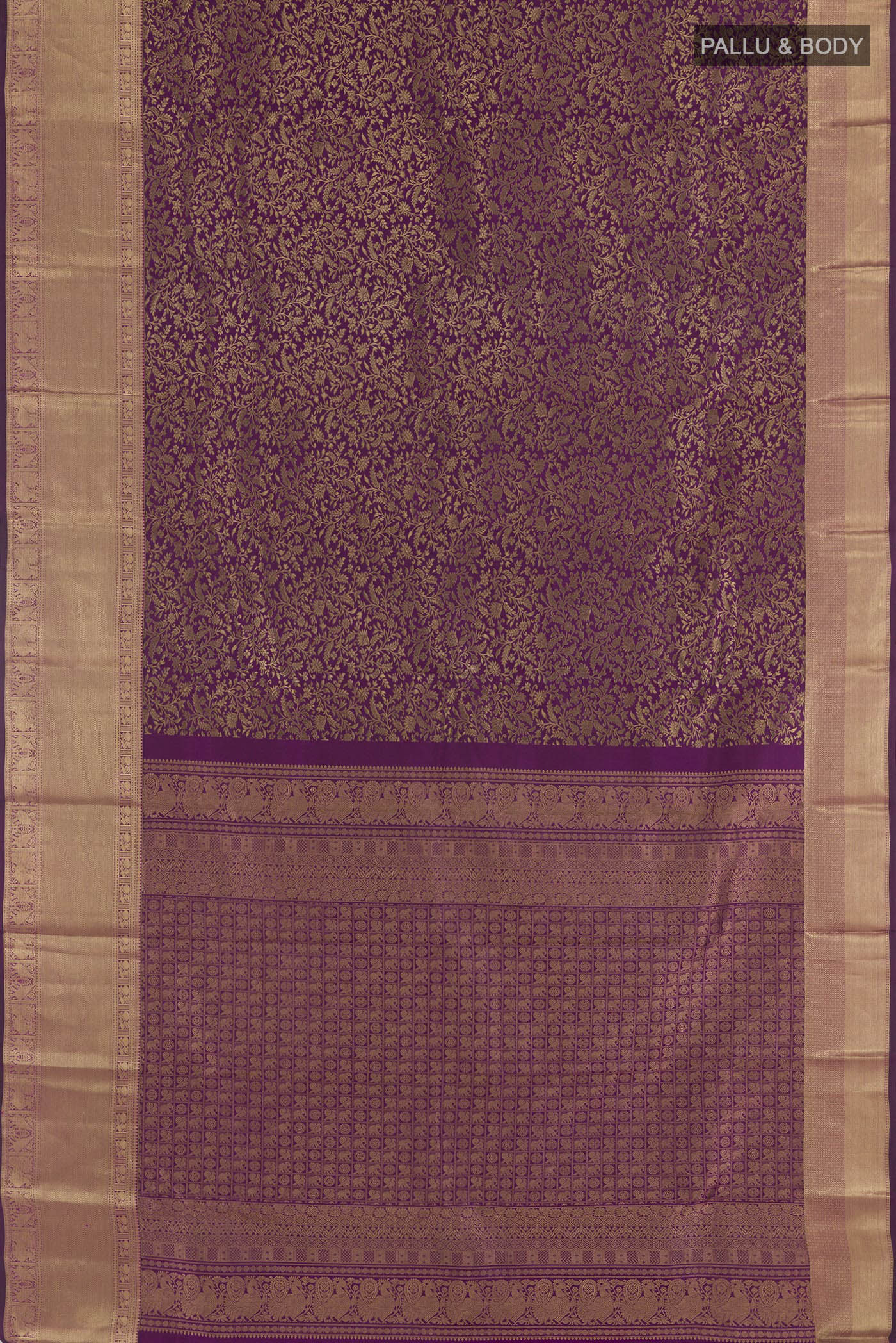 Flat view of Purple Kanchipuram Silk Saree with Zari Brocade on the body and Zari Border. 