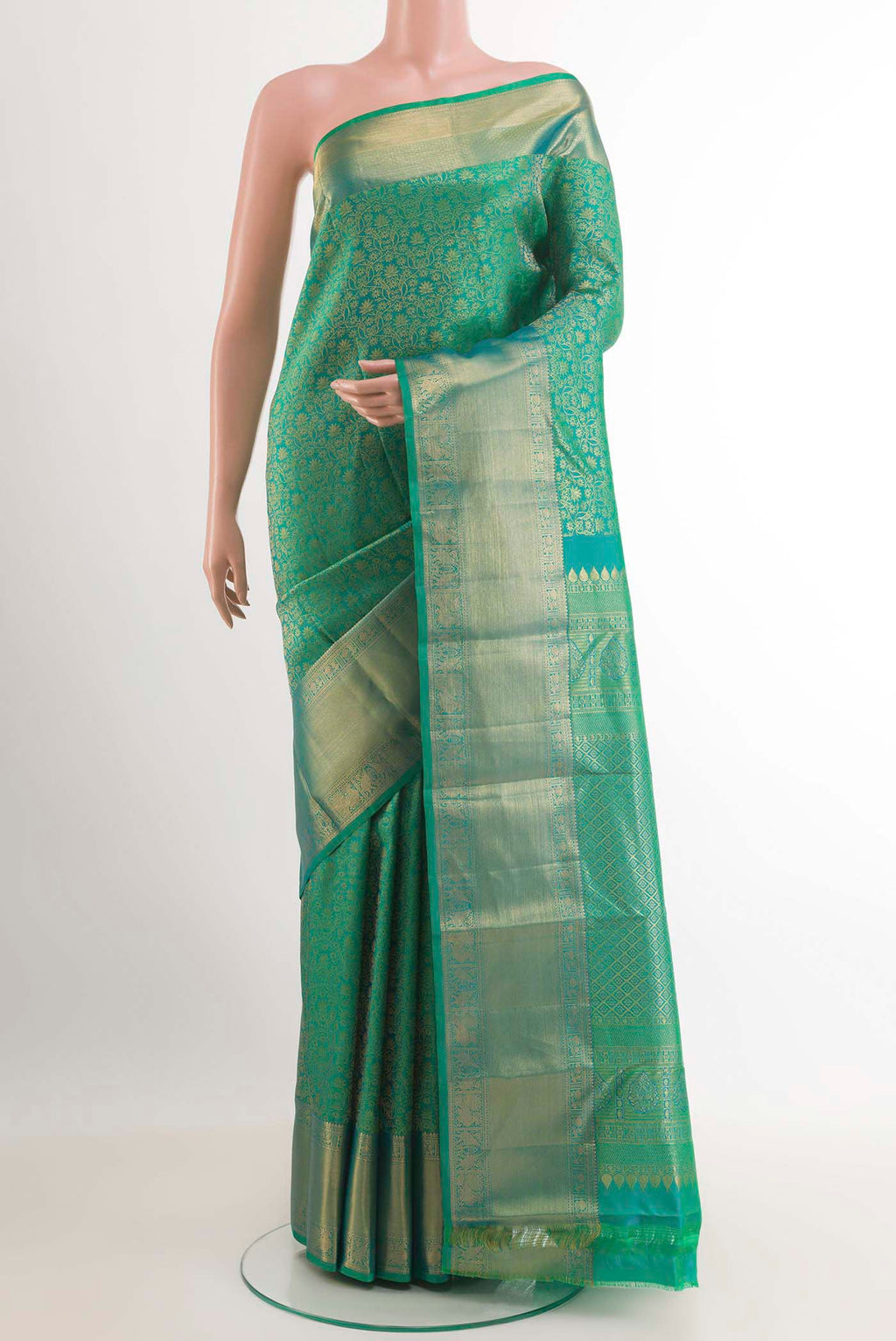 Sea Green Kanchipuram Silk Saree with Zari Brocade on the body and Zari Border.  displayed on a mannequin