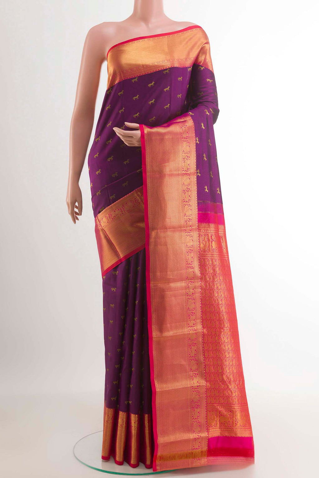 Purple Kanchipuram Silk Saree with Zari Butta on the body and Zari Border.  displayed on a mannequin