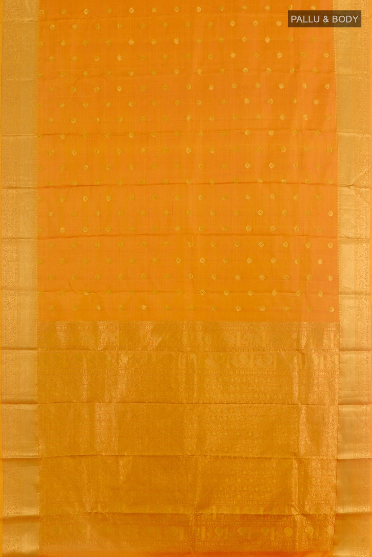 Flat view of Mustard Kanchipuram Silk Saree with Zari Butta on the body and Zari Border. 