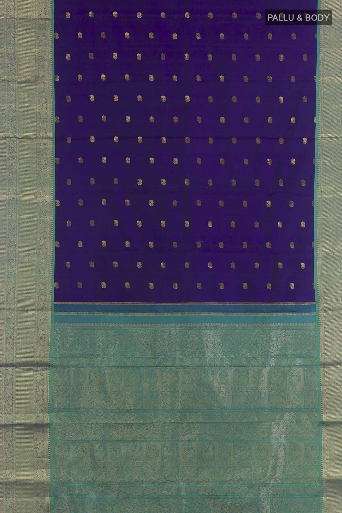 Flat view of Blue Kanchipuram Silk Saree with Zari Butta on the body and Zari Border. 