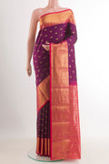 Purple Kanchipuram Silk Saree with Zari Brocade on the body and Zari Border.  displayed on a mannequin