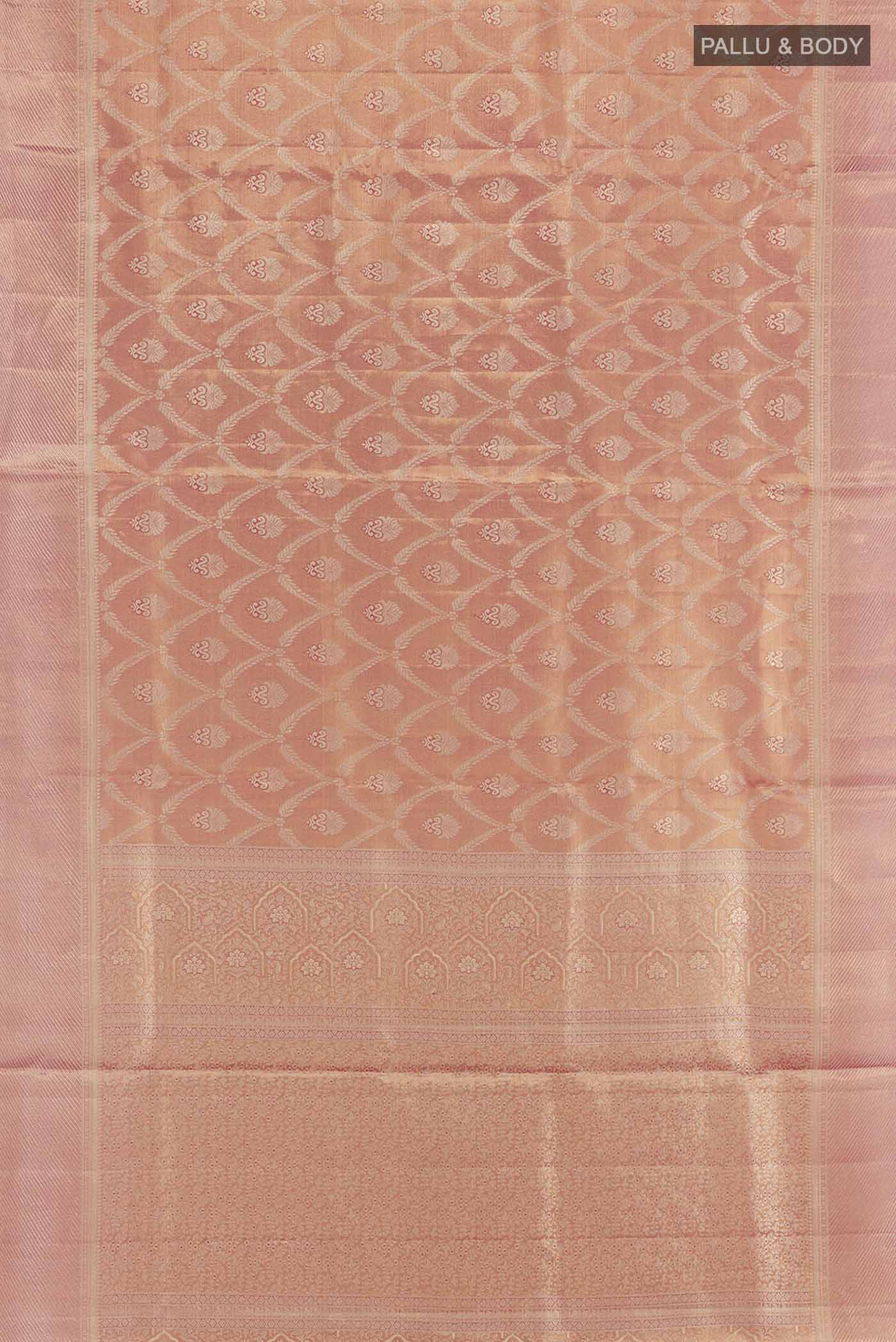 Flat view of Rose Gold Kanchipuram Tissue Silk Saree with Zari Brocade on the body and Zari Border. 