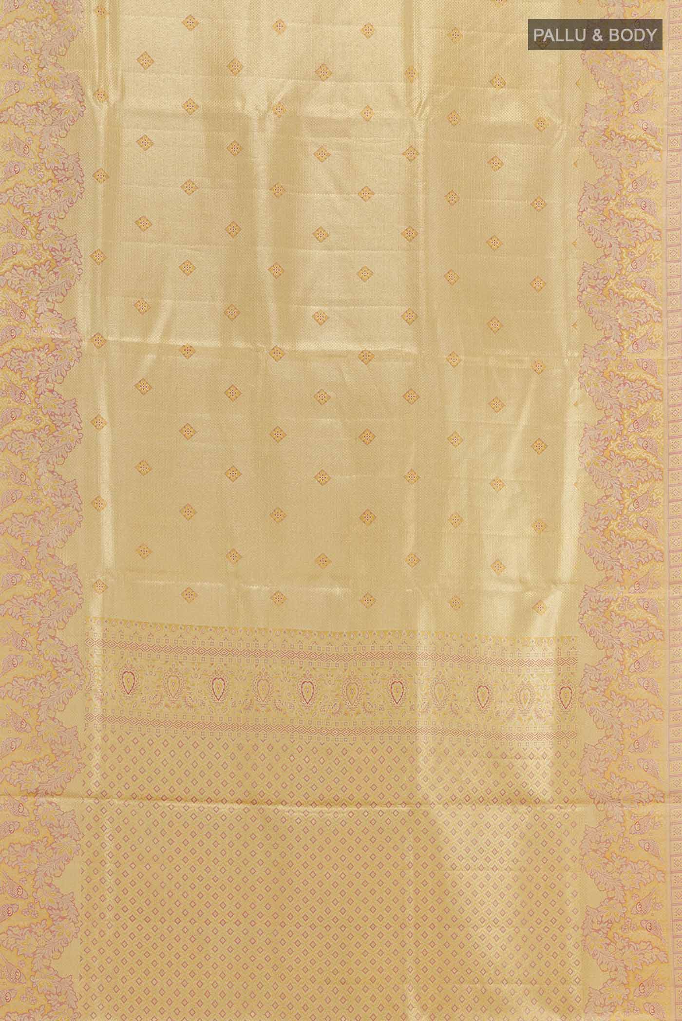 Flat view of Golden Kanjivaram Tissue Silk Saree with Zari Brocade on the body and Zari Border. 