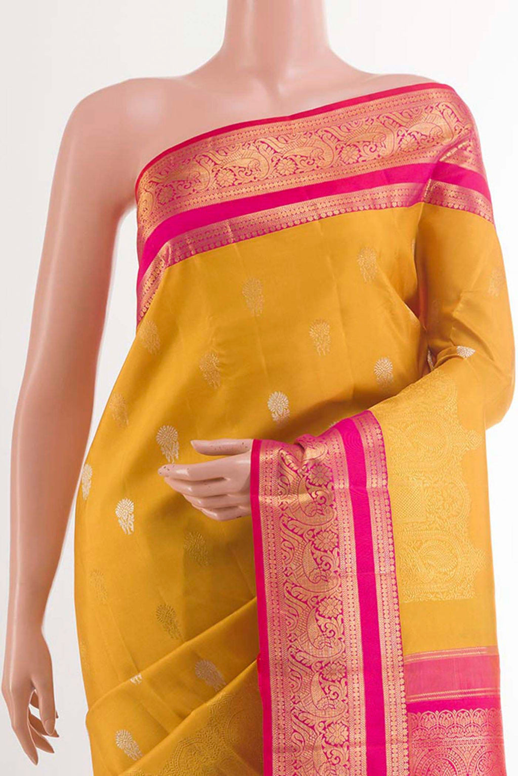 Border image of Yellow Kanchipuram Silk Saree with Zari Butta on the body and Ganga Jamuna Border. 