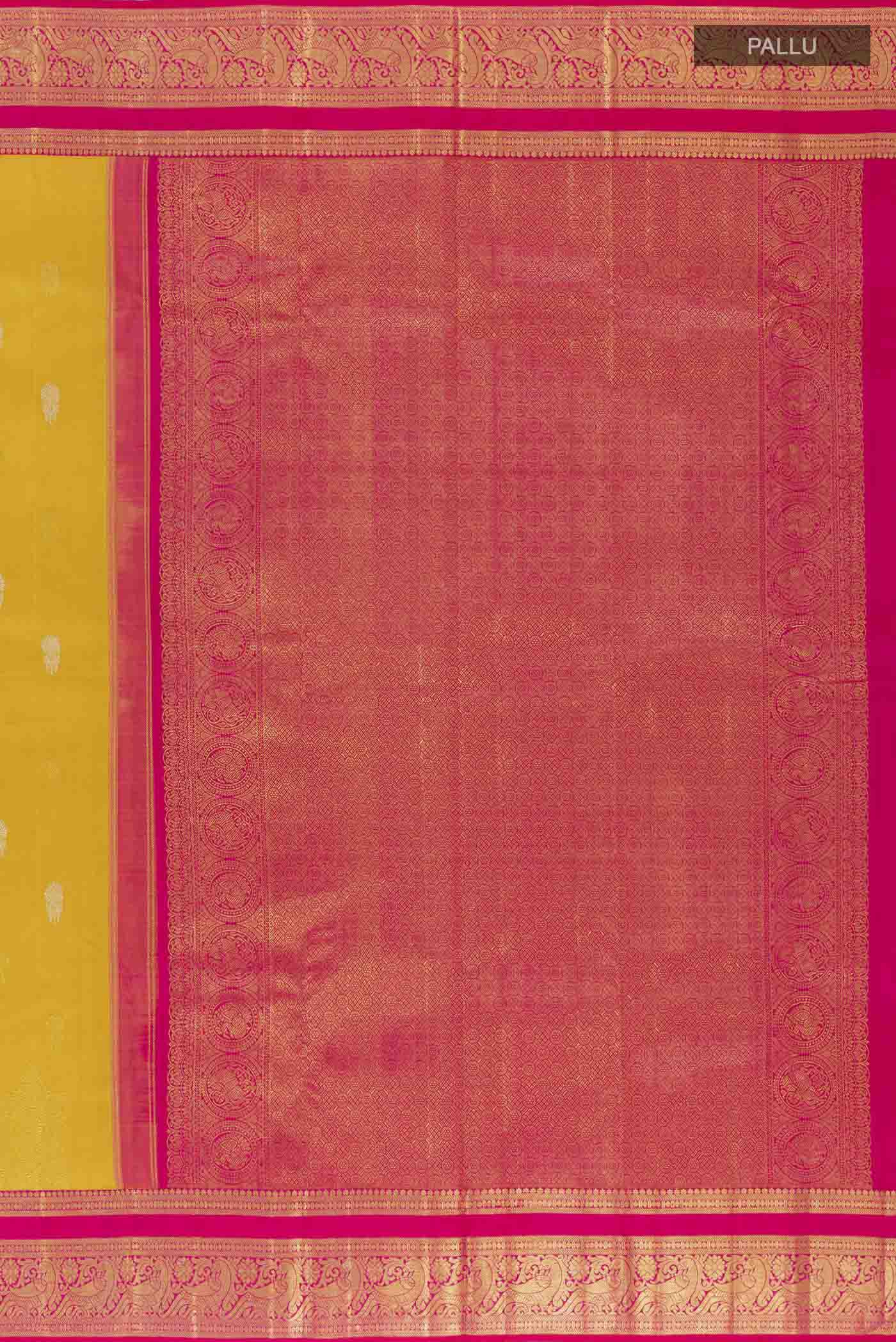 Close up image of the pallu of Yellow Kanchipuram Silk Saree with Zari Butta on the body and Ganga Jamuna Border. 