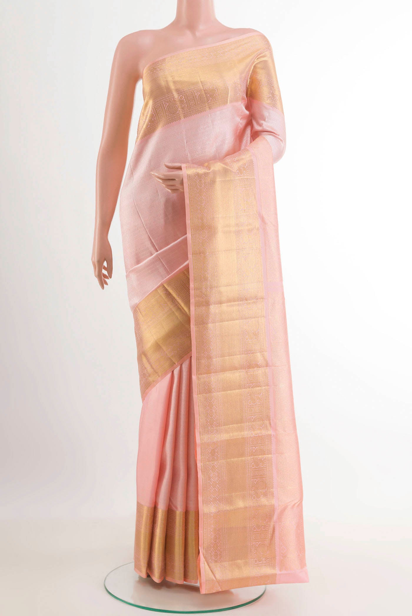 Pink Kanchipuram Silk Saree with Zari Brocade on the body and Zari Border.  displayed on a mannequin