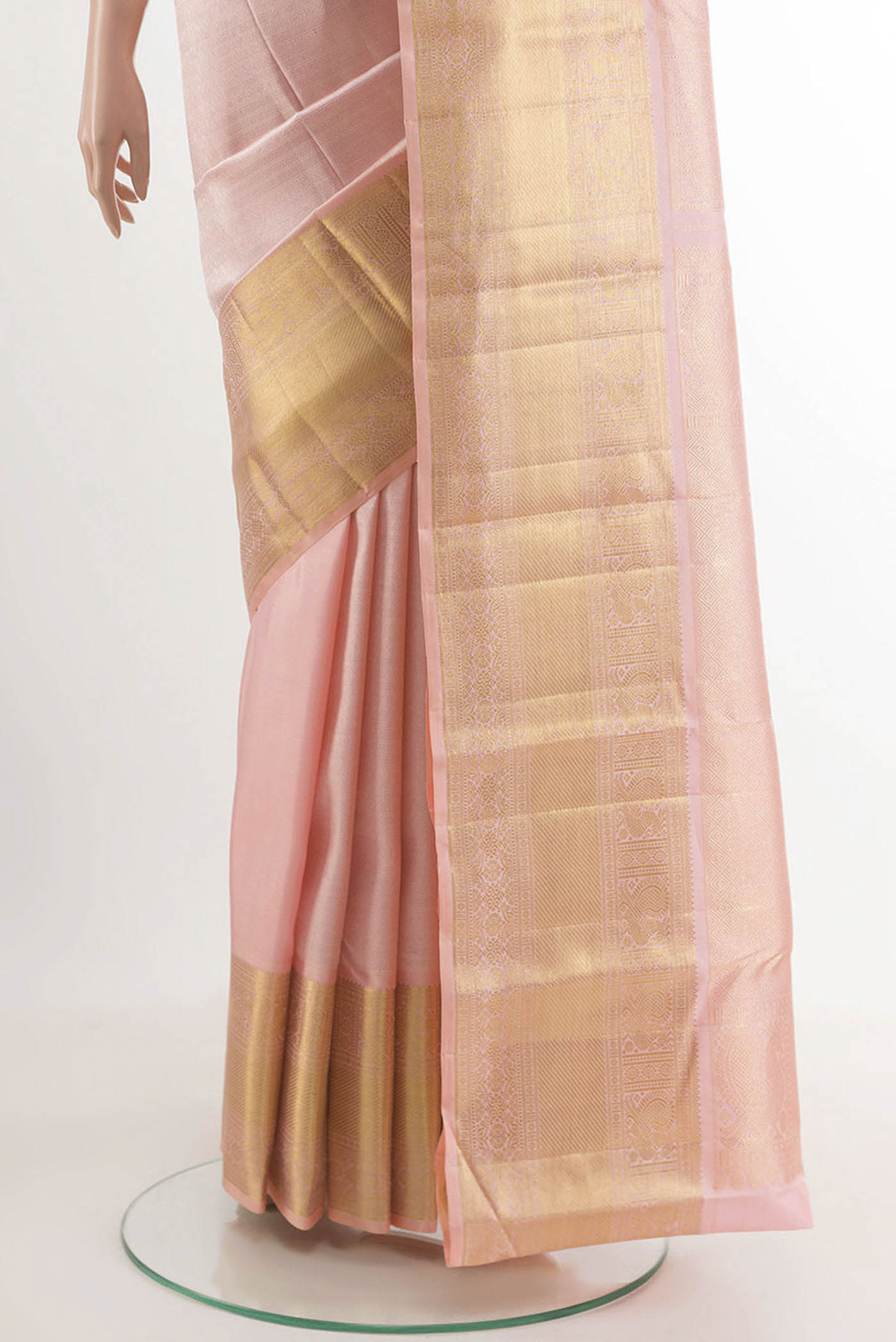 Pleats and pallu of Pink Kanchipuram Silk Saree with Zari Brocade on the body and Zari Border. 
