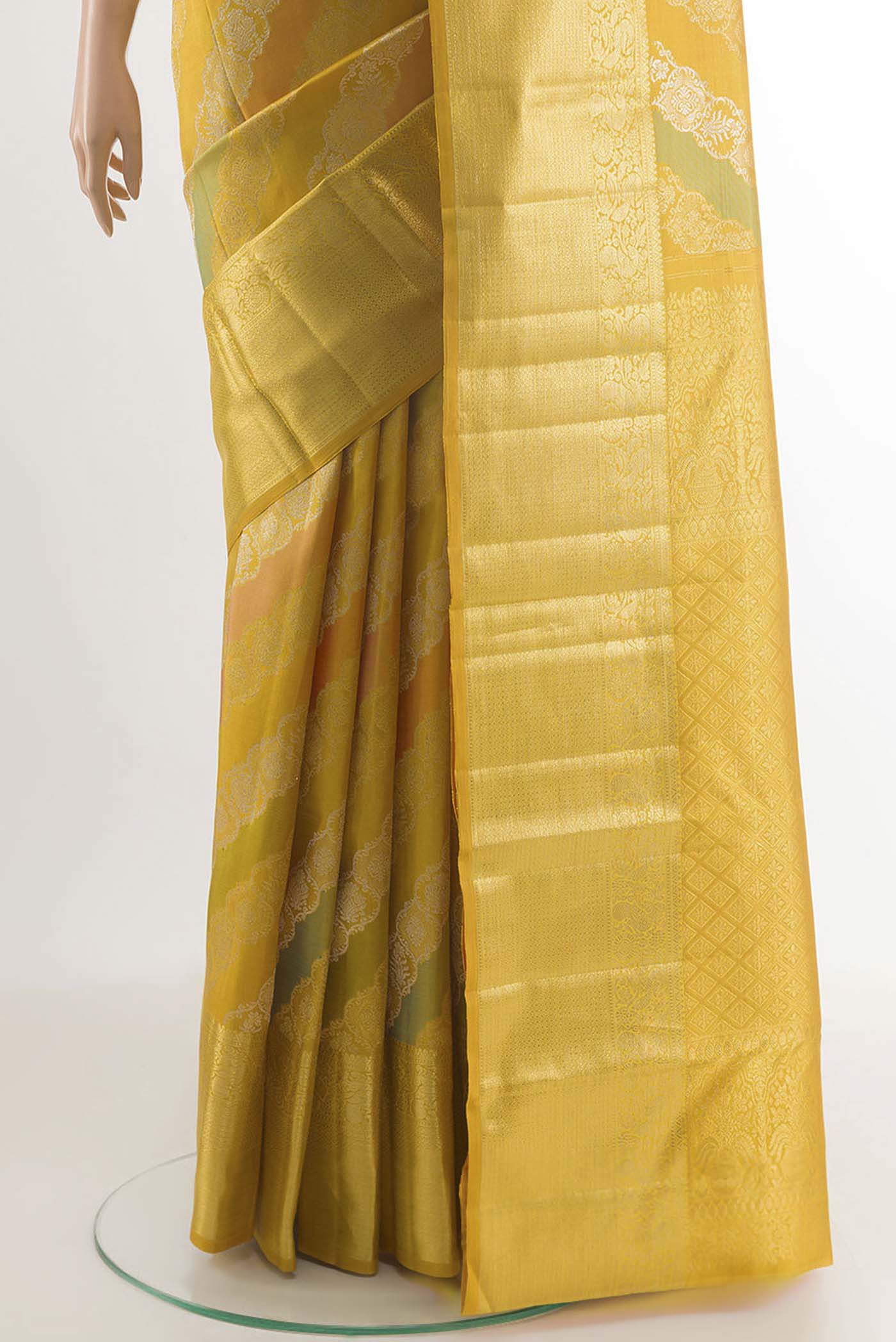 Pleats and pallu of Yellow Kanjivaram Silk Saree with Zari Brocade on the body and Zari Border. 