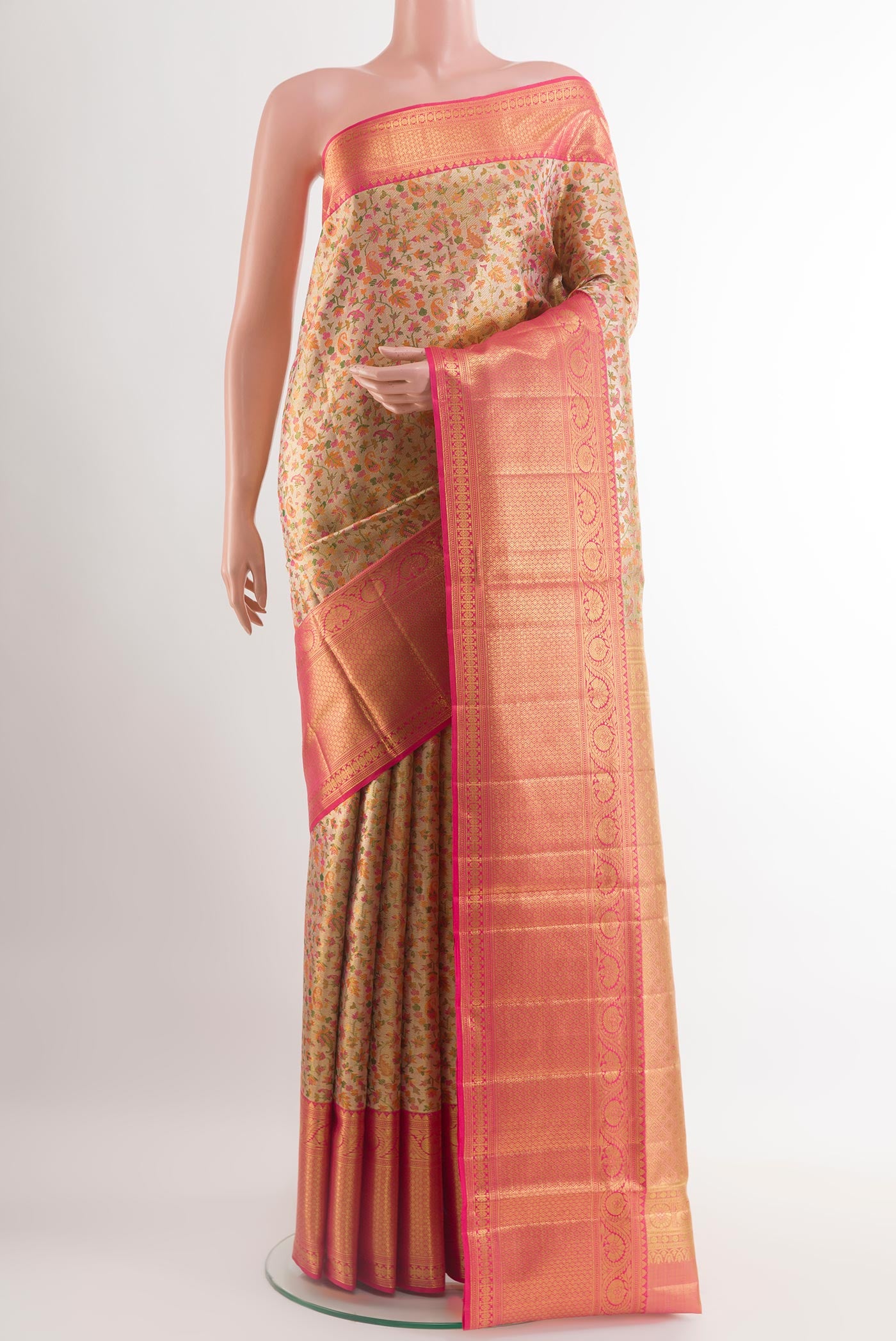 Multi Color Kanjivaram Tissue Silk Saree with Zari Brocade on the body and Zari Border.  displayed on a mannequin