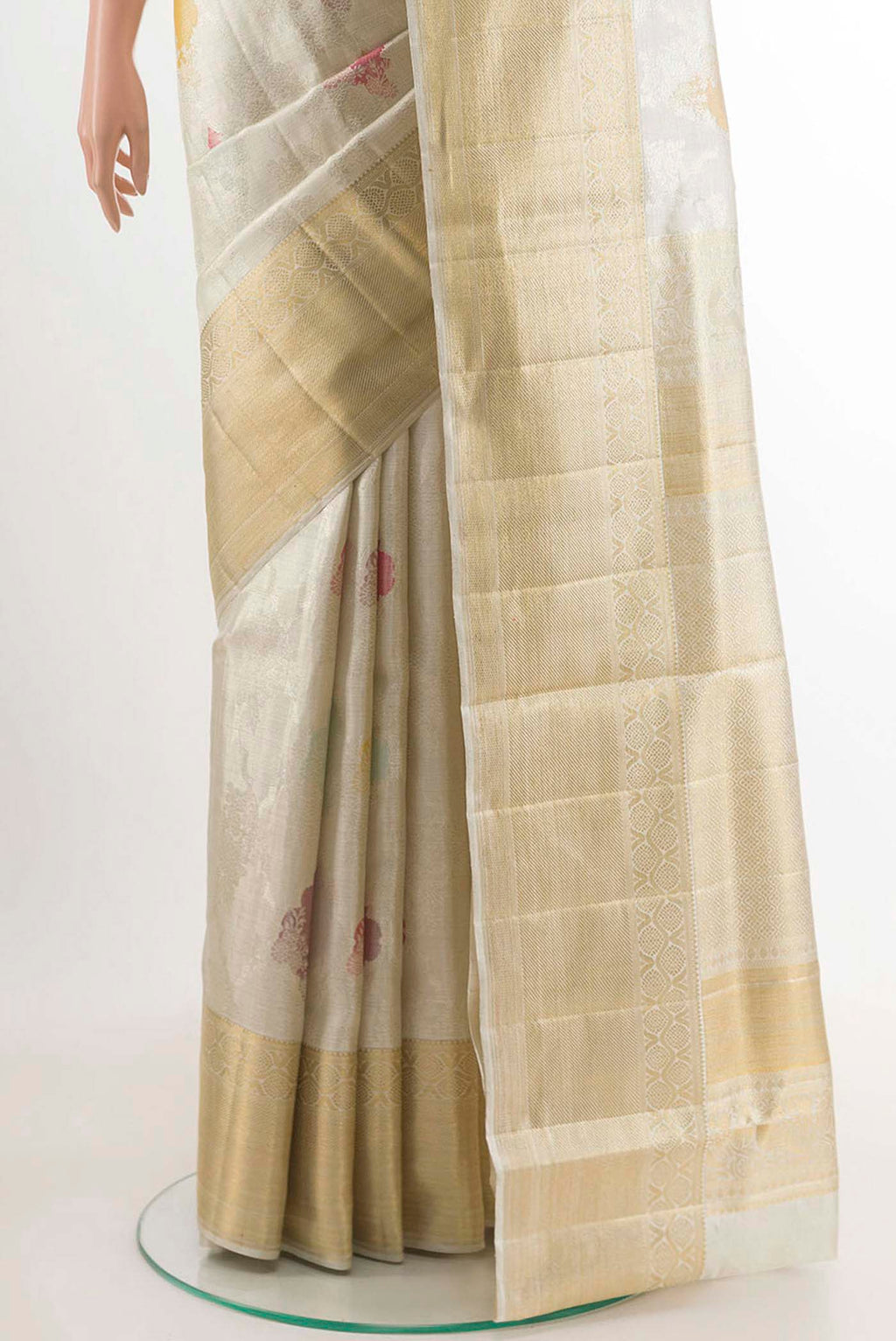 Pleats and pallu of Pure Silk Pure Zari Off White Kanjivaram Tissue Saree with Zari Brocade on the body and Zari Border. 