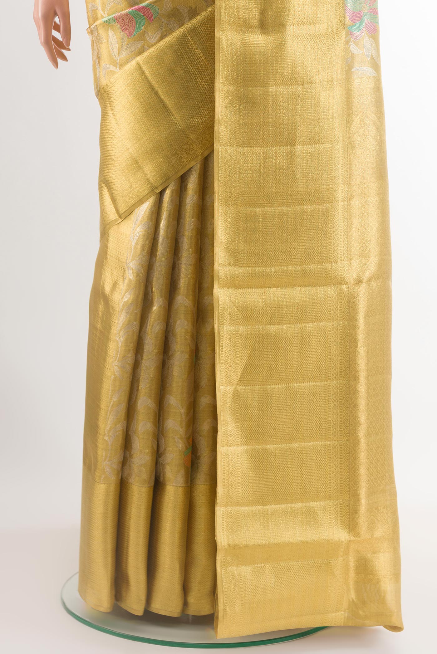Pleats and pallu of Golden Kanjivaram Tissue Silk Saree with Zari Brocade on the body and Zari Border. 