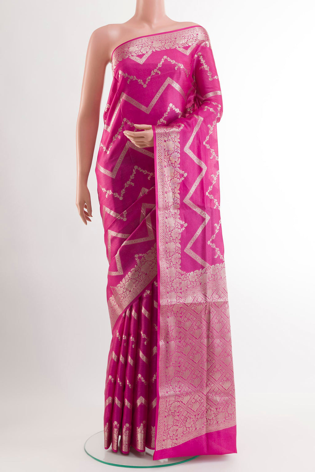 Pink Tussar Silk Saree with Zari Brocade on the body and Zari Border.  displayed on a mannequin