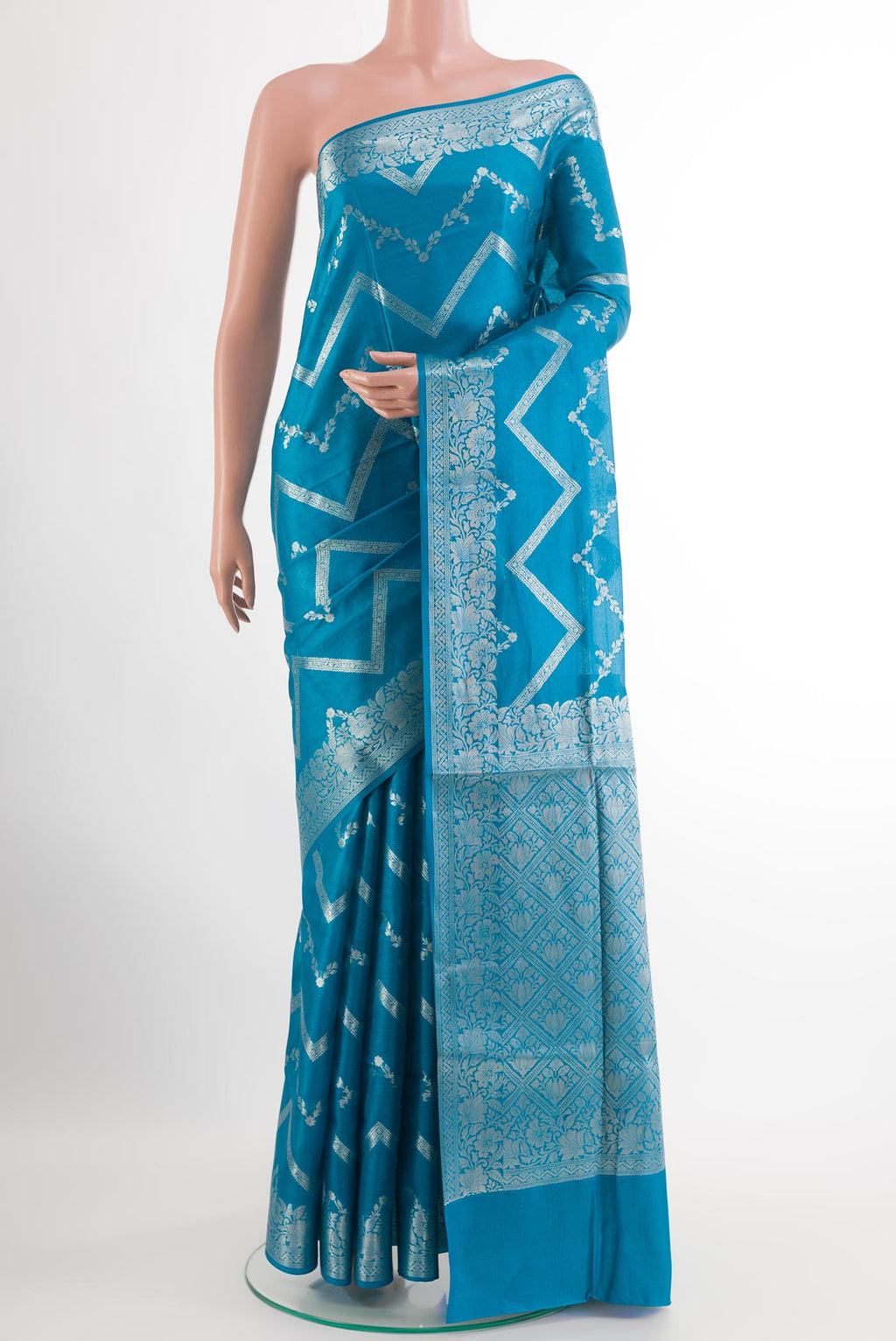 Blue Tussar Silk Saree with Zari Brocade on the body and Zari Border.  displayed on a mannequin