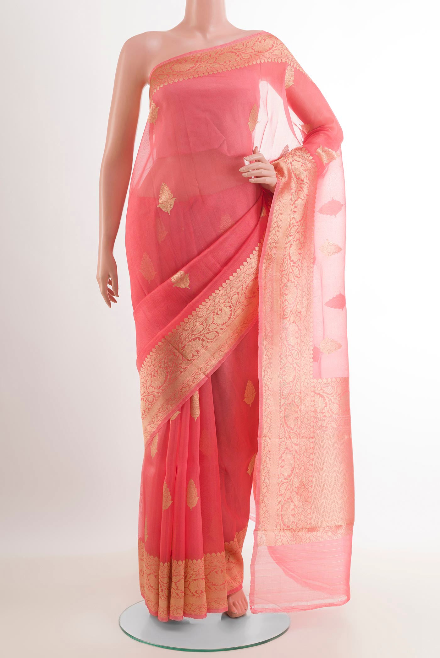 Pink Banarasi Kora Silk Saree with Zari Butta on the body and Zari Border.  displayed on a mannequin