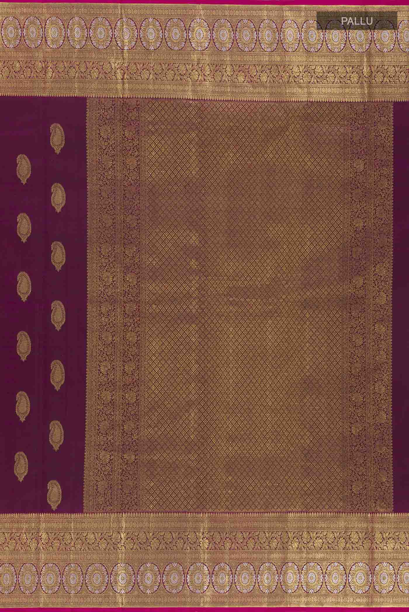 Close up image of the pallu of Purple Kanjivaram Silk Saree with Zari Butta on the body and Zari Border. 