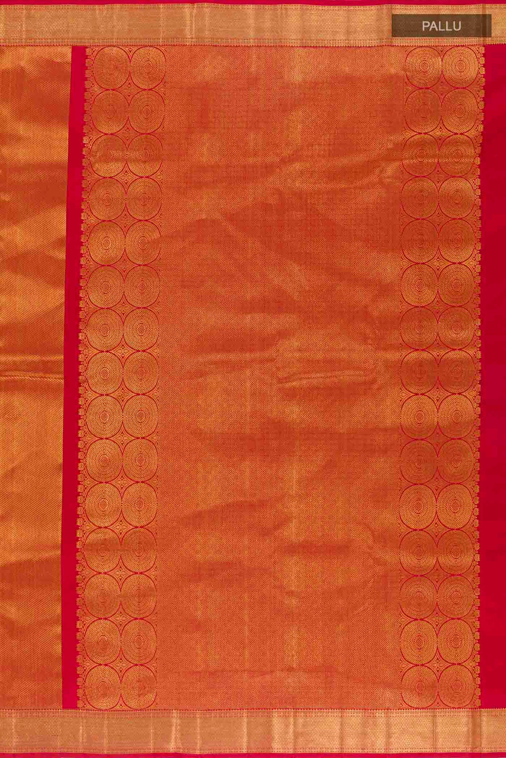 Close up image of the pallu of Golden Kanchipuram Silk Saree with Zari Brocade on the body and Ganga Jamuna Border. 