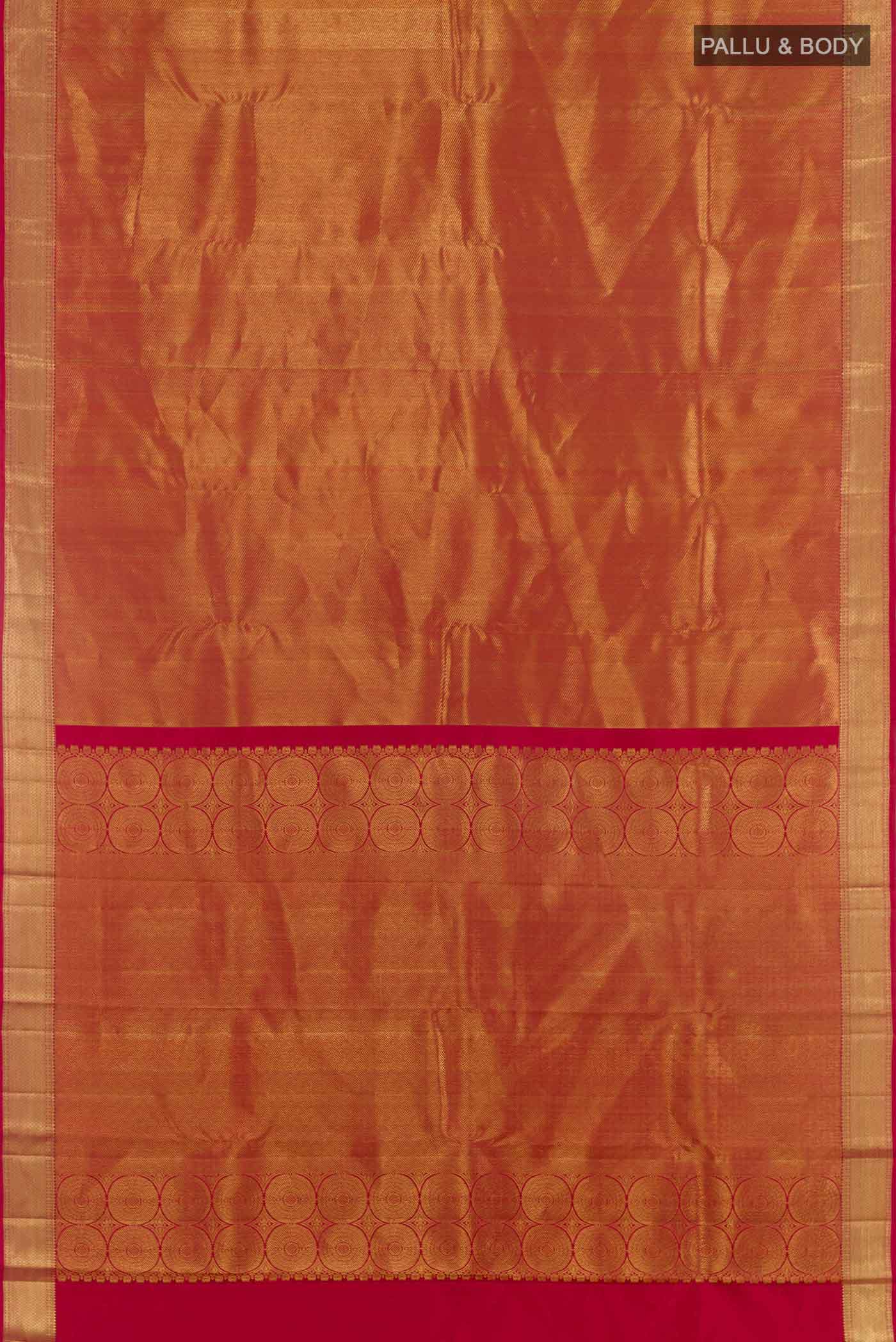 Flat view of Golden Kanchipuram Silk Saree with Zari Brocade on the body and Ganga Jamuna Border. 