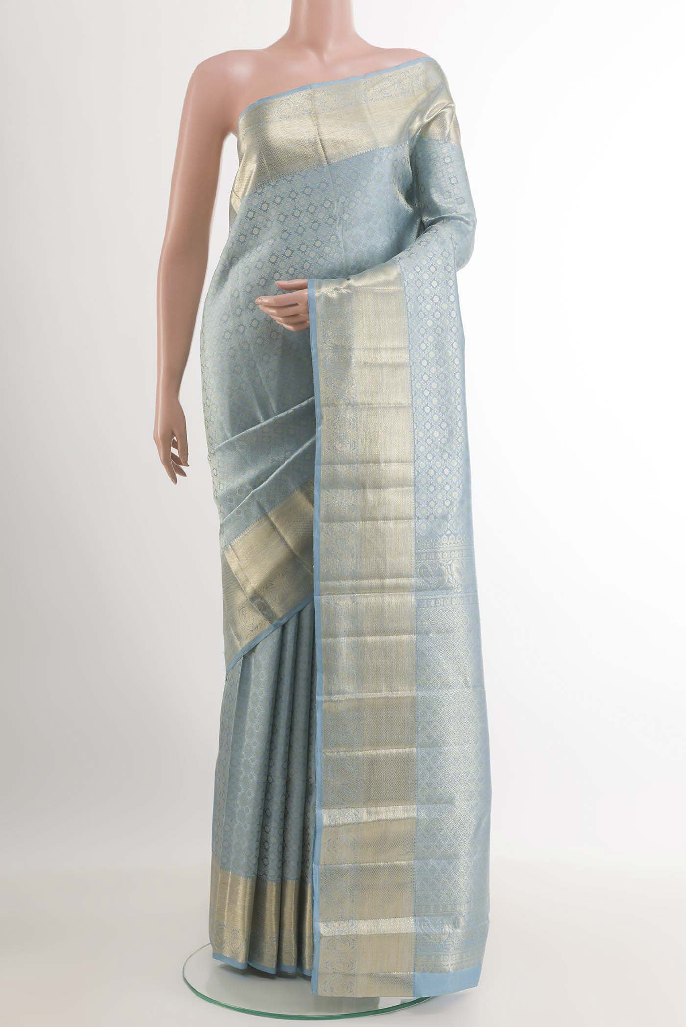 Blue Kanchipuram Silk Saree with Zari Brocade on the body and Zari Border.  displayed on a mannequin