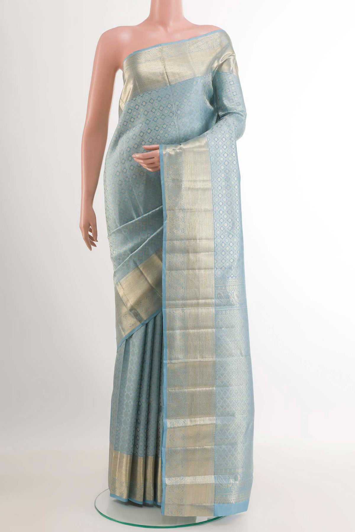 Blue Kanchipuram Silk Saree with Zari Brocade on the body and Zari Border.  displayed on a mannequin