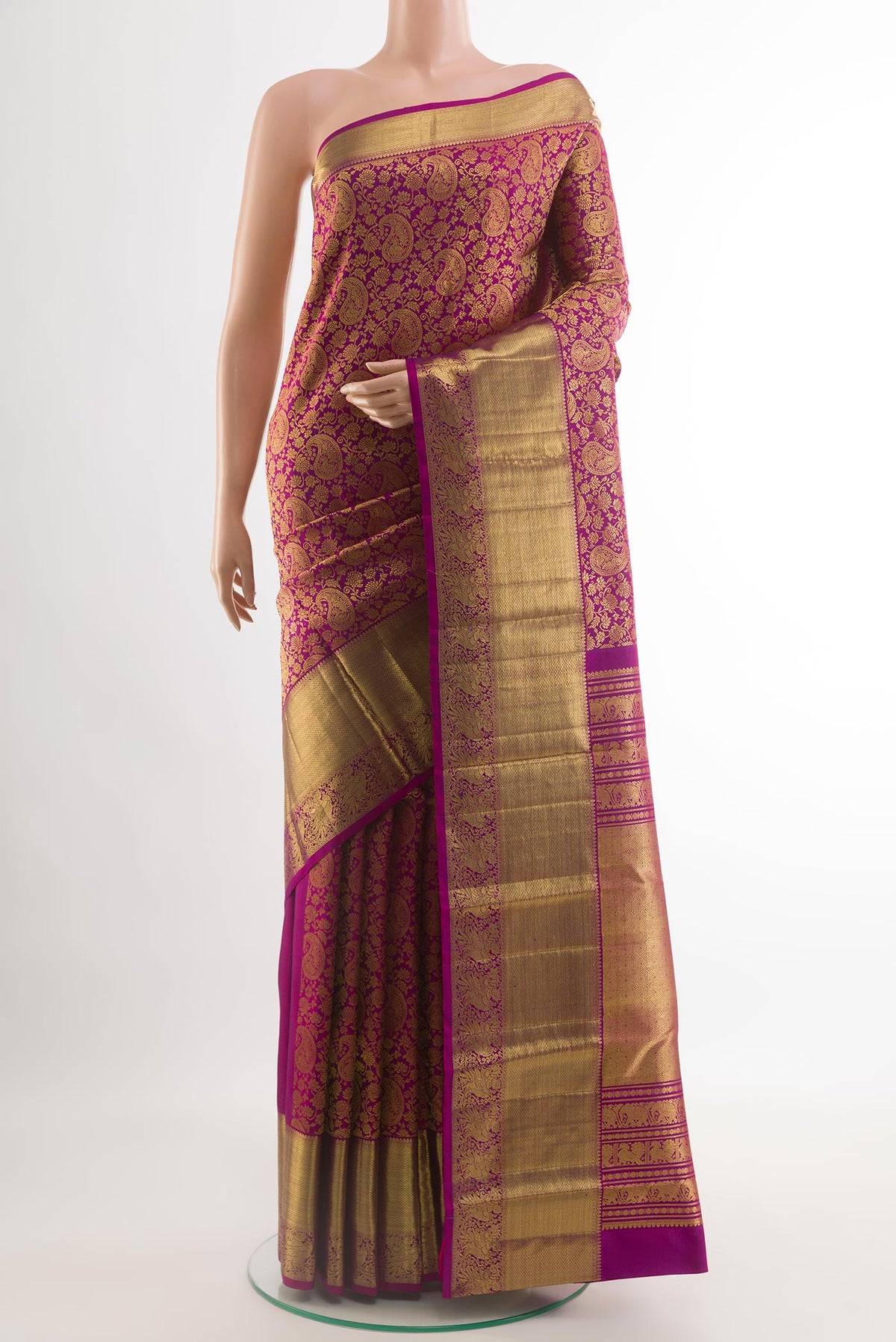Purple Kanchipuram Silk Saree with Zari Brocade on the body and Zari Border.  displayed on a mannequin