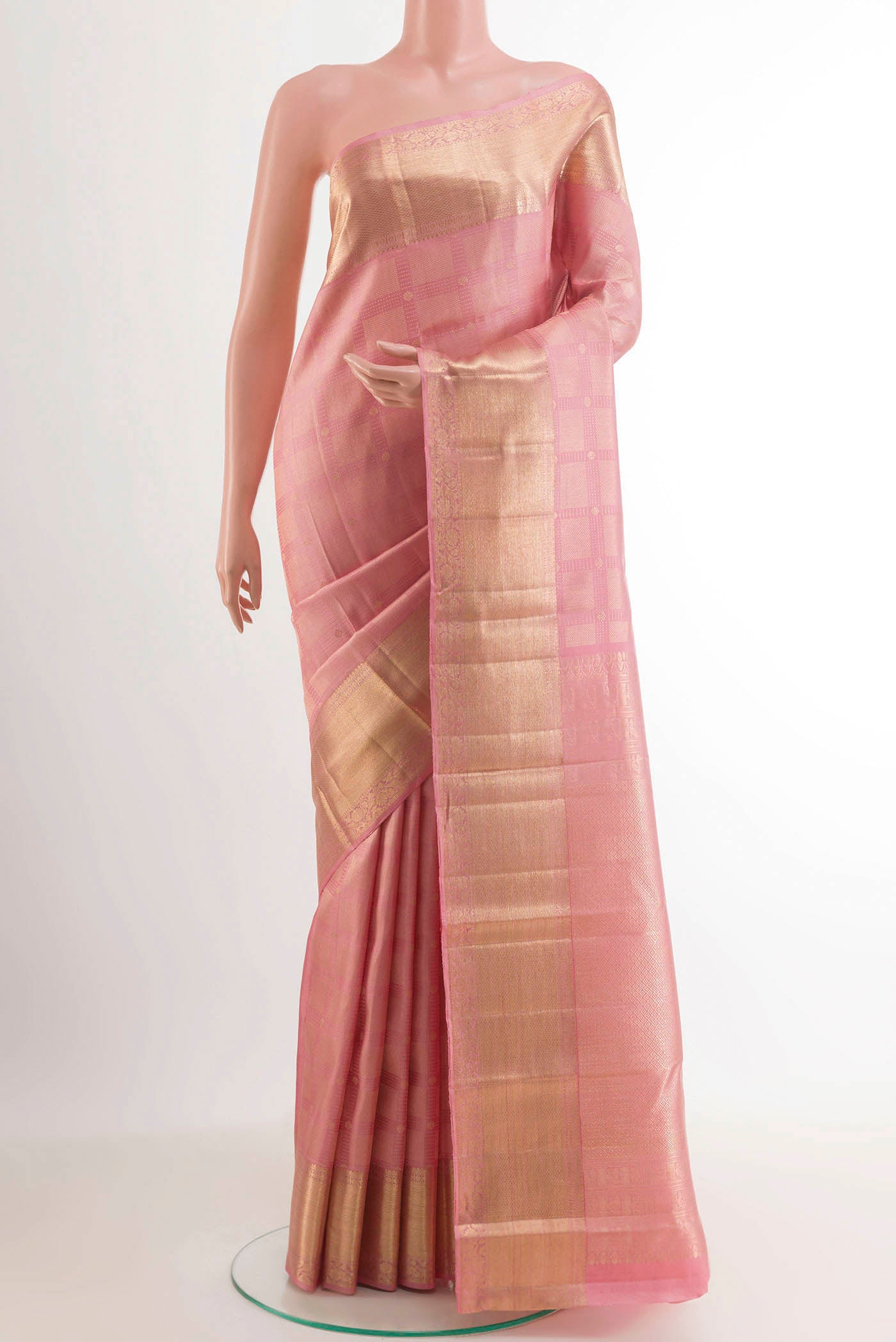 Pink Kanchipuram Silk Saree with Zari Brocade on the body and Zari Border.  displayed on a mannequin